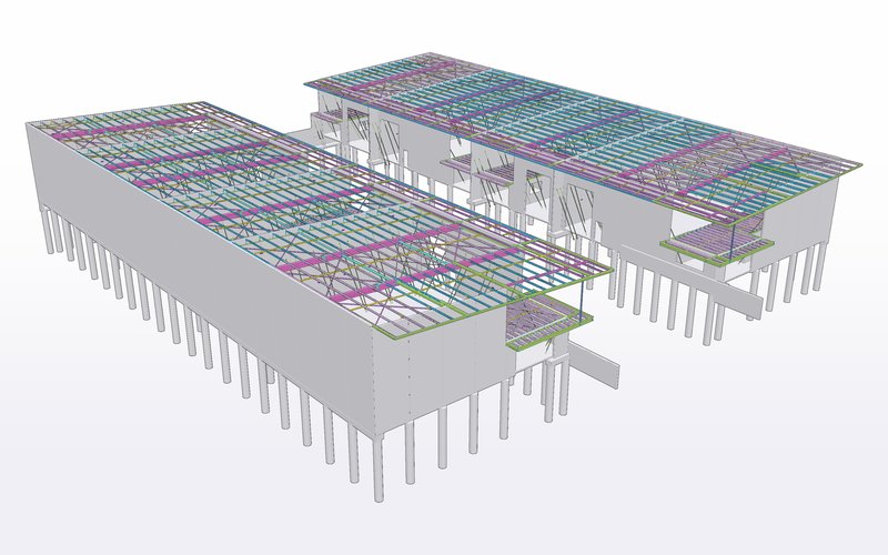 Tekla model of two industrial buildings with precast wall panels and steel roof framing